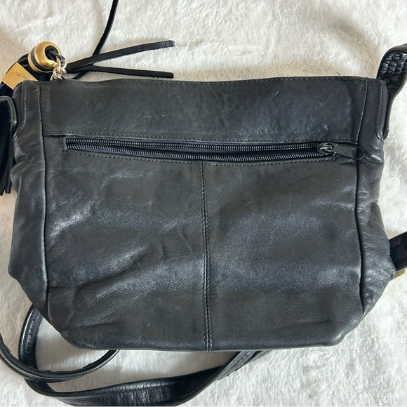 Tignanello Black Crossbody Leather Bag with Tassel Charm - Picture 9 of 12
